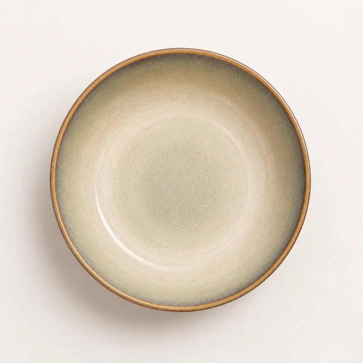 Top view of beige ceramic chawan matcha bowl with speckled interior glaze