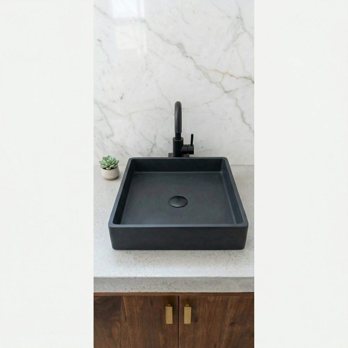 Charcoal black square vessel sink made from stone composite on modern bathroom vanity
