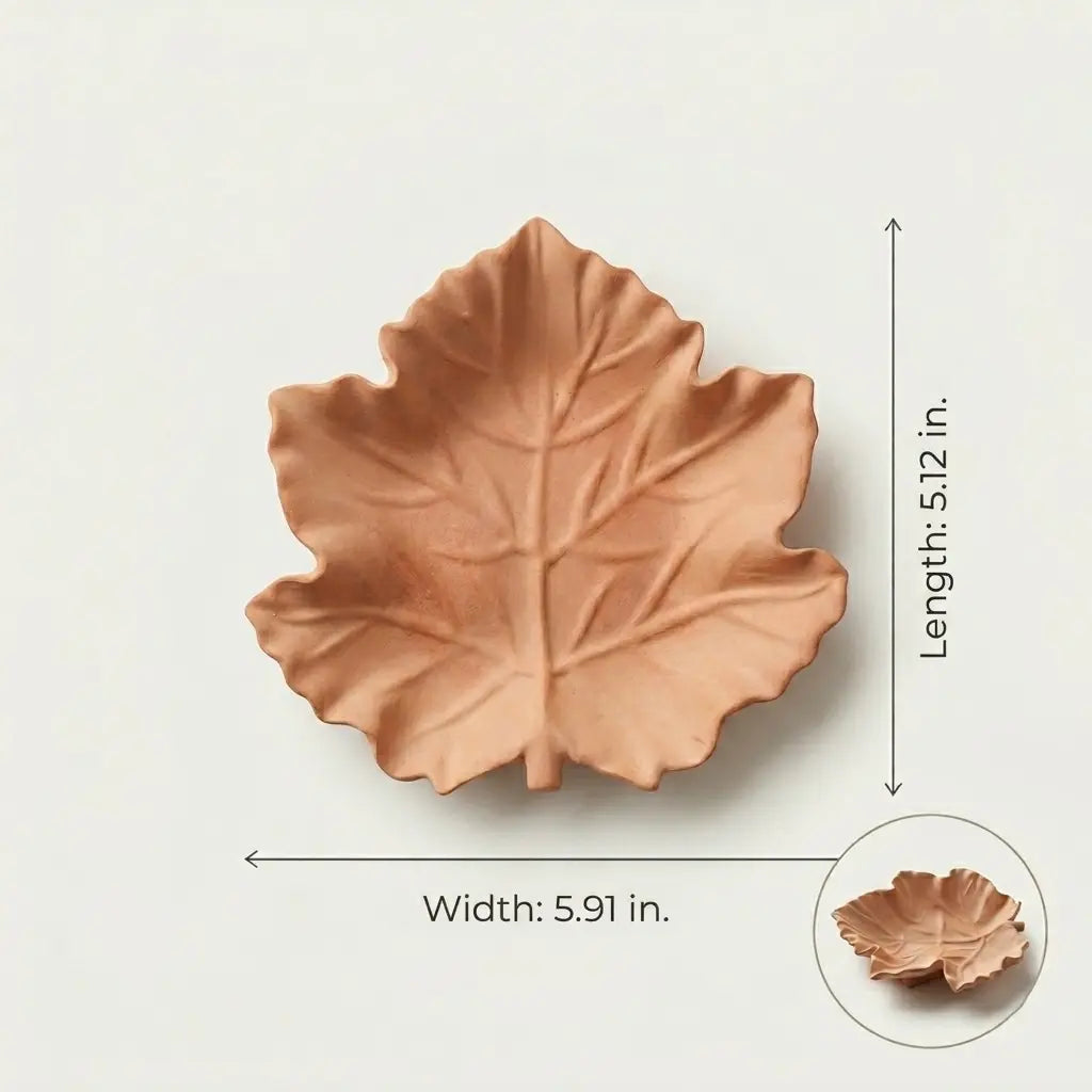 Size guide for terracotta leaf jewelry dish measuring 5.91 inches wide and 5.12 inches long
